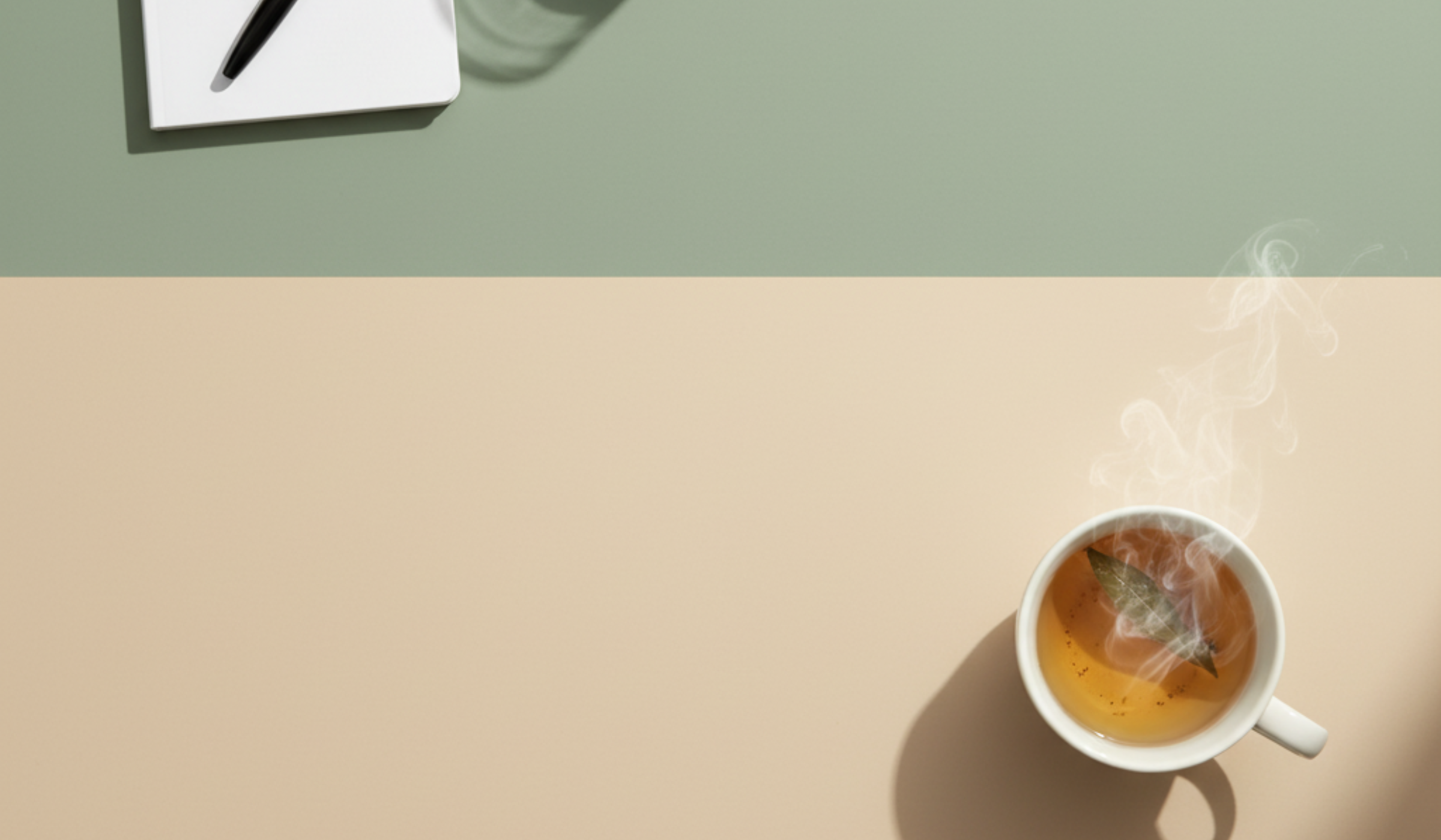 Minimal pastel wellness background with glass of water, herbal tea, notebook, and soft natural shadows.
