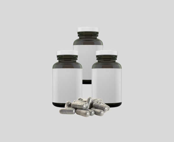 Generic unlabeled supplement bottles with gray capsules—typical competitor mushroom pills with unclear potency.