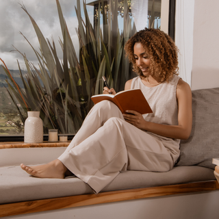 Person reading at home — “Sexual Wellness”: supports libido and male confidence.