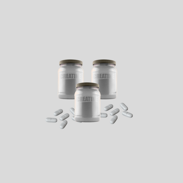creatine supplement jars with capsules displayed on white background