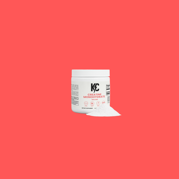 creatine monohydrate powder tub with scoop on white background